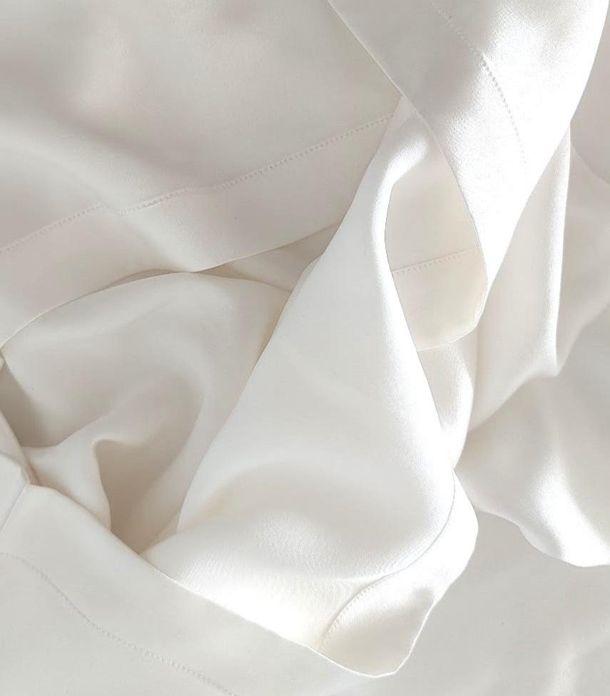 Silkesörngott i ofärgat peace silk – detaljbild